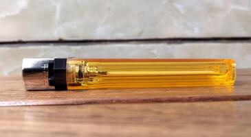 Vape e-cigarette on a wooden table, close up. photo