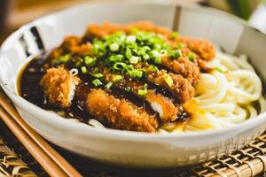 AI generated Crispy Chicken over Noodles with Scallions photo