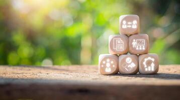 Onboarding concept, Wooden block on desk with onboarding icon on virtual screen. photo