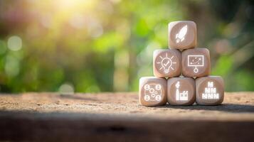 Startup concept, Wooden block on desk with startup icon on virtual screen. photo