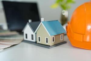 Real estate planning concept with miniature houses photo