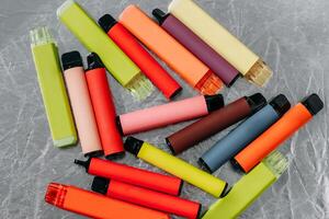 Multicolored multi-use electronic vape cigarettes photo