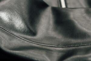 Black texture eco soft leather, fashionable jacket photo