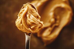 AI generated Creamy peanut butter on a spoon, close-up. photo