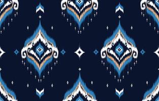 African Ikat paisley seamless pattern. geometric ethnic oriental pattern traditional on blue background. Aztec style abstract vector illustration.design for texture,fabric, clothing,wrapping,carpet.