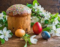 Easter egg panettone bread cake background Happy easter spring holiday tulip photo