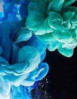 Color drop in water. Colorful ink in water. Abstract background photo