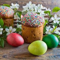 Easter egg panettone bread cake background Happy easter spring holiday tulip photo