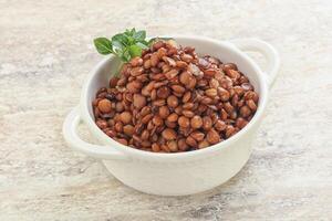 Boiled lentil in the bowl photo
