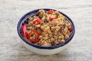 Arabic cous cous with meat and tomato photo