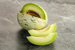 Ripe sweet and juicy dalmatian melon photo