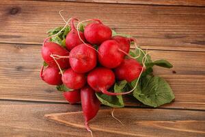 Heap ripe fresh red radish photo