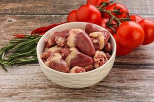 Raw chicken hearts for cooking photo