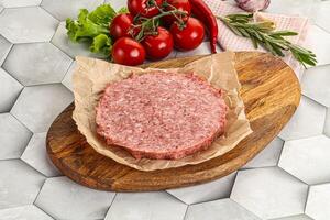 Raw beef uncooked burger cutlet photo