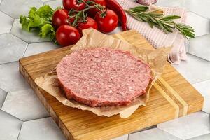 Raw beef uncooked burger cutlet photo