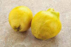 Fresh ripe yellow quince fruit photo