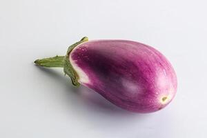 Raw purple ripe eggplant for cooking photo