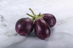 Raw smal asian baby eggplant photo