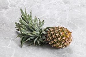 Sweet organic ripe tropical pineapple photo