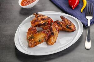 Buffalo grilled chicken wings barbecue photo