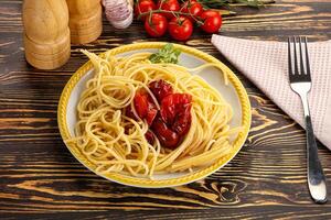 Italian pasta spaghetti with tomato photo