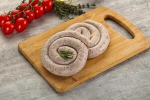 Natural spiral sausage for grill photo