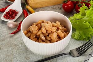 White canned beans in the bowl photo