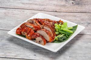 Asian cuisine - roasted duck with skin photo