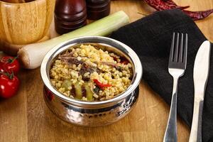 Bulgur with lamb and vegetables photo