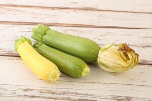 Raw baby organic zucchini heap photo