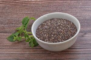 Dietary chia seeds in the bowl photo