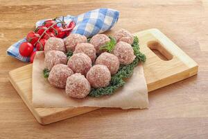 Raw pork meatball for cooking photo