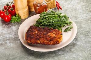 Tasty roasted breaded meat schnitzel photo