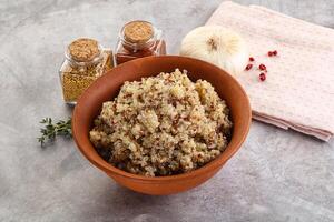 Vegan cuisine - boiled quinoa cereal photo