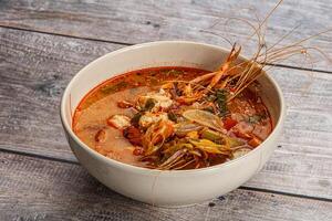 Thai traditional cuisine - Tom Yum soup photo