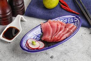 Japanese cuisine - sliced tuna sashimi photo