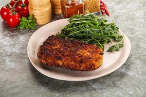 Tasty roasted breaded meat schnitzel photo