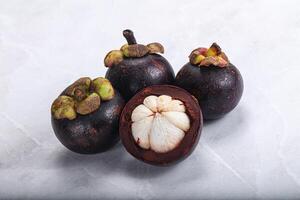 Sweet ripe juicy tropical Mangosteen photo