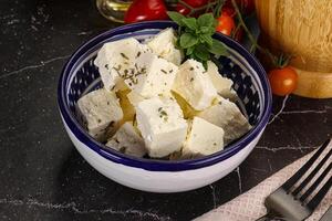 Greek traditional Feta cheese cubes photo