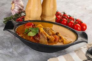 Yellow Thai curry with beef photo