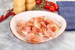 Spanish cured pork meat - Jamon photo