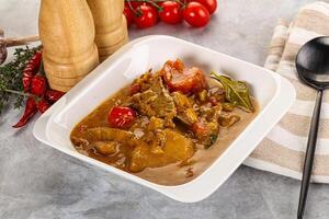 Yellow Thai curry with beef photo