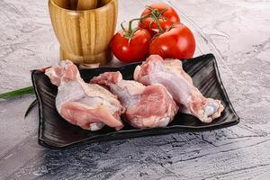 Raw turkey shoulder wing for cooking photo