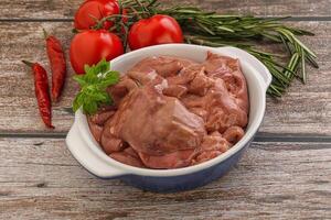 Raw chicken liver in the bowl photo