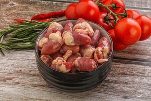 Raw chicken hearts for cooking photo