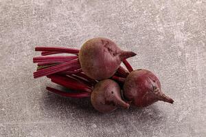 Young raw beetroot heap isolated photo