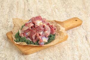 Raw chicken stomach for cooking photo