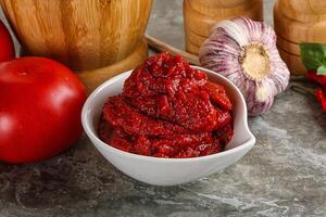 Natural organic red tomato paste photo