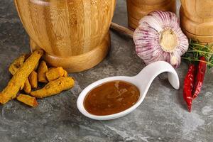 Indian curry sauce in the bowl photo