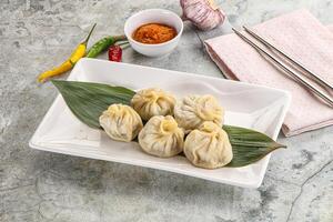 Chinese traditional steamed dumpligs momo photo